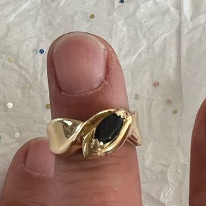 14 karat gold ring with sapphire and and mini diamond size 6 or possibly 7